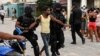 Un joven detenido en La Güinera, en el municipio de Arroyo Naranjo, La Habana, el 12 de julio de 2021.