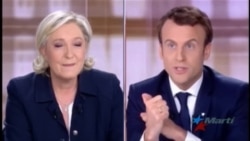Macron y Le Pen se enfrentan en un virulento debate presidencial Macron y Le Pen se enfrentan en un virulento debate presidencial