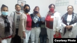 Madres de algunos de los detenidos del 11 de julio en San Antonio de los Baños quienes asistieron este 25 de diciembre a la misa del gallo en la Iglesia Católica de San Antonio