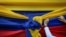 Una de las partidarias de la oposición sostiene una tela con los colores de la bandera venezolana antes de un mitin con el líder opositor Juan Guaidó en Caracas. [Archivo]