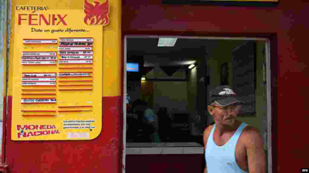 Fotografía de un cartel de productos con sus respectivos precios.