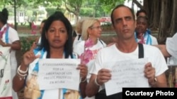 Zaqueo Báez (UNPACU) y María Josefa Acón, Dama de Blanco.